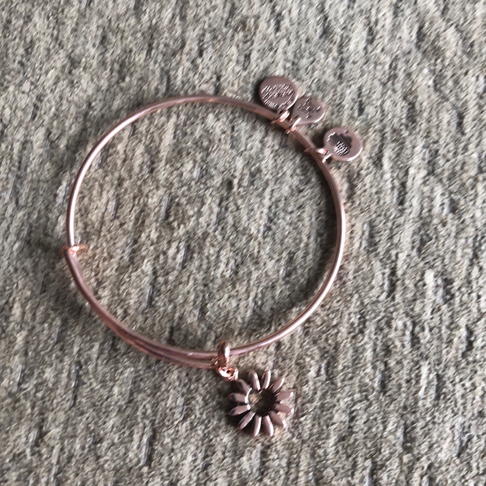 Bronze colored bangle bracelet.